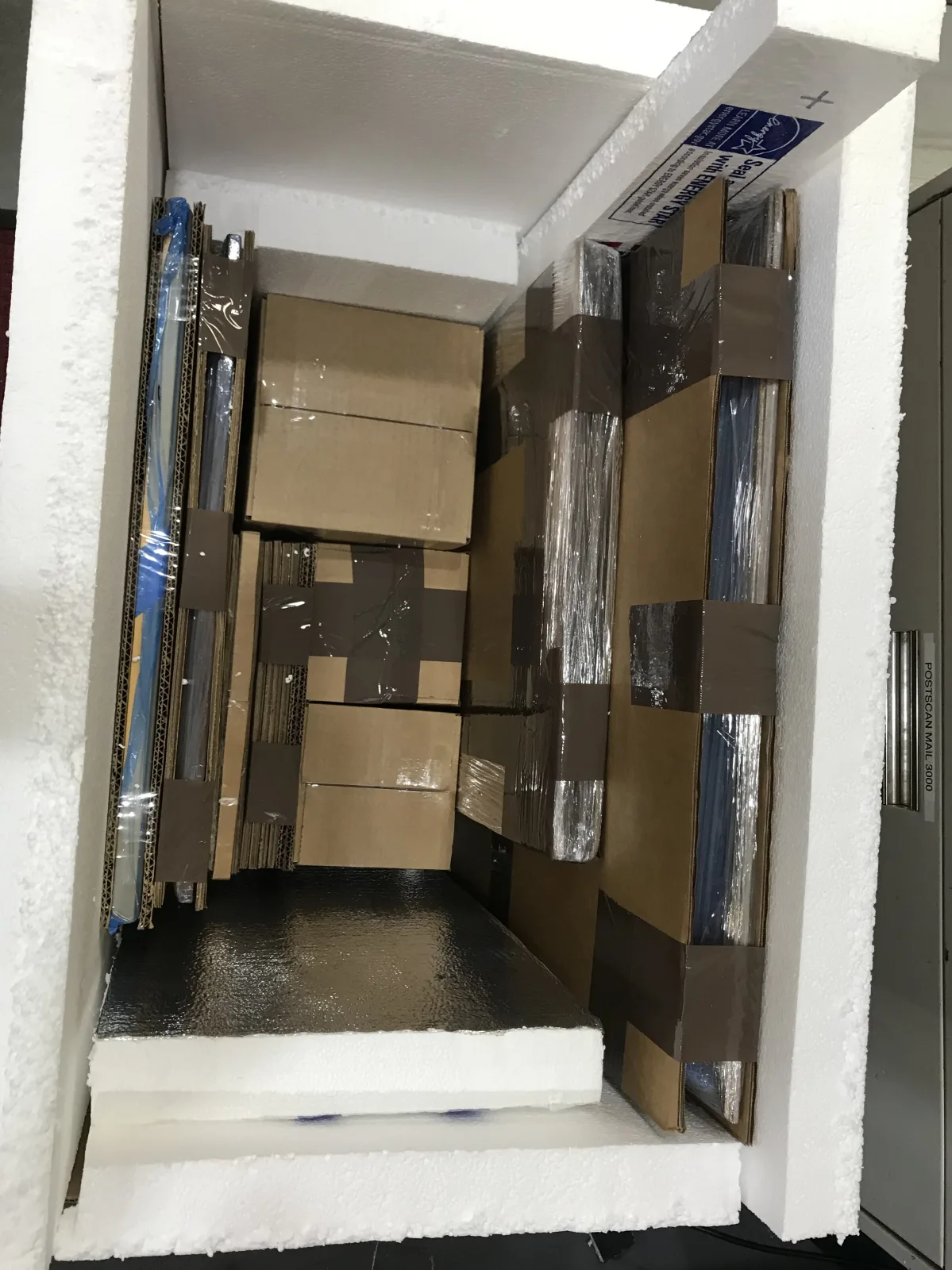 Custom foam-lined crate with protected items fitted inside