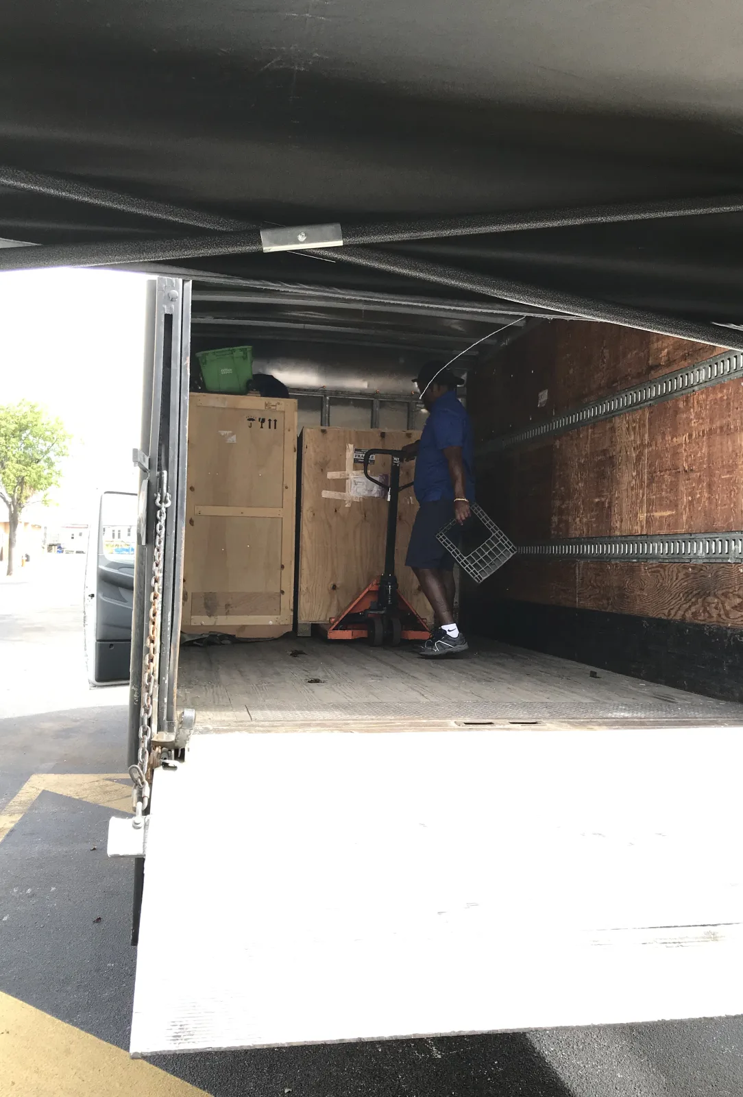 Large custom crate positioned inside a delivery vehicle
