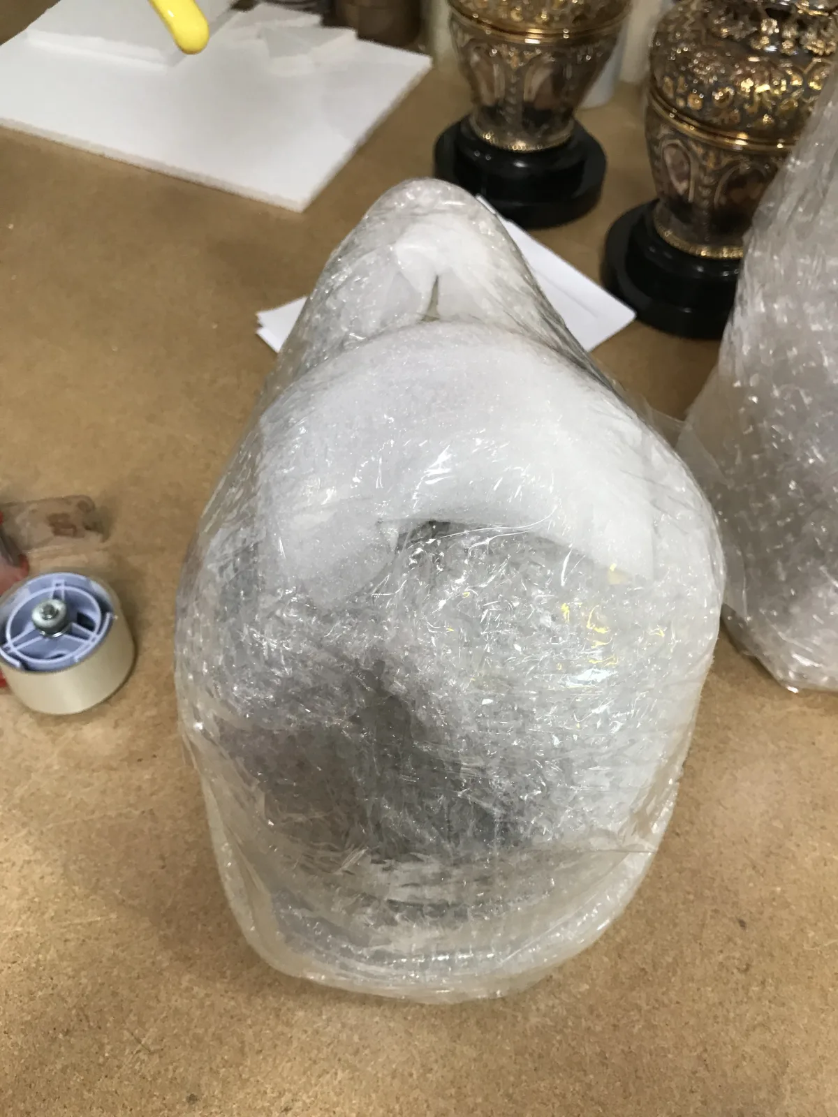 Rounded decorative piece fully cushioned for packing