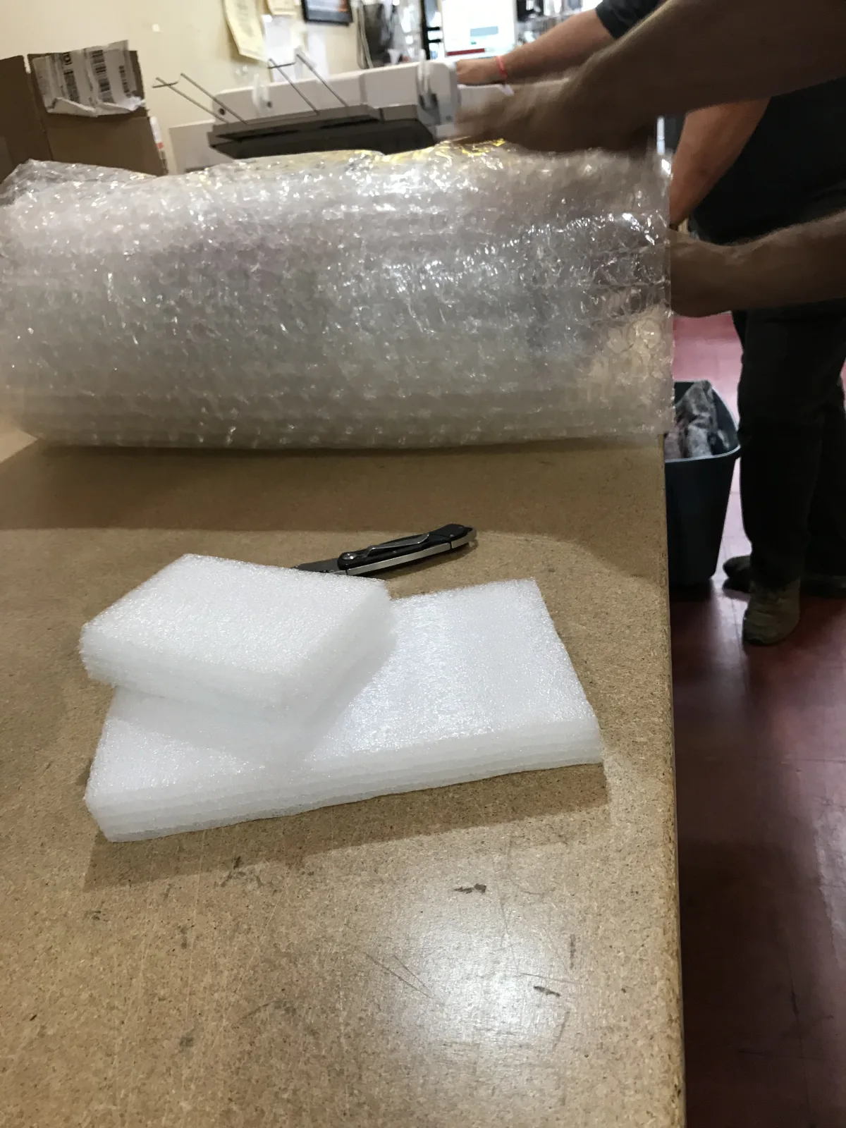 Bubble wrap and foam materials prepared on the packing bench
