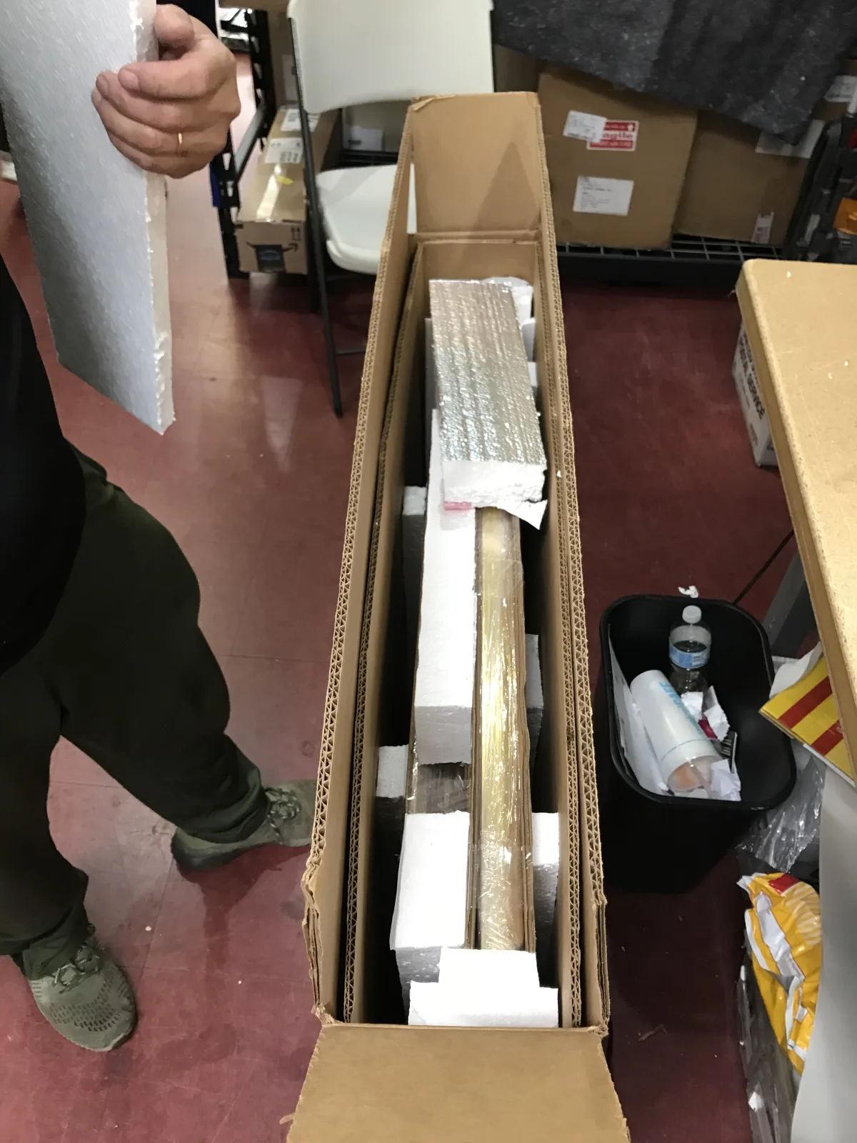 Long item fitted between custom foam supports