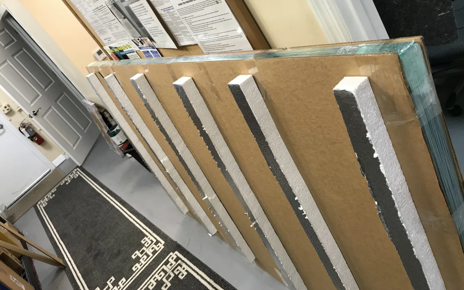 Several framed pieces prepared with reinforced edge protection