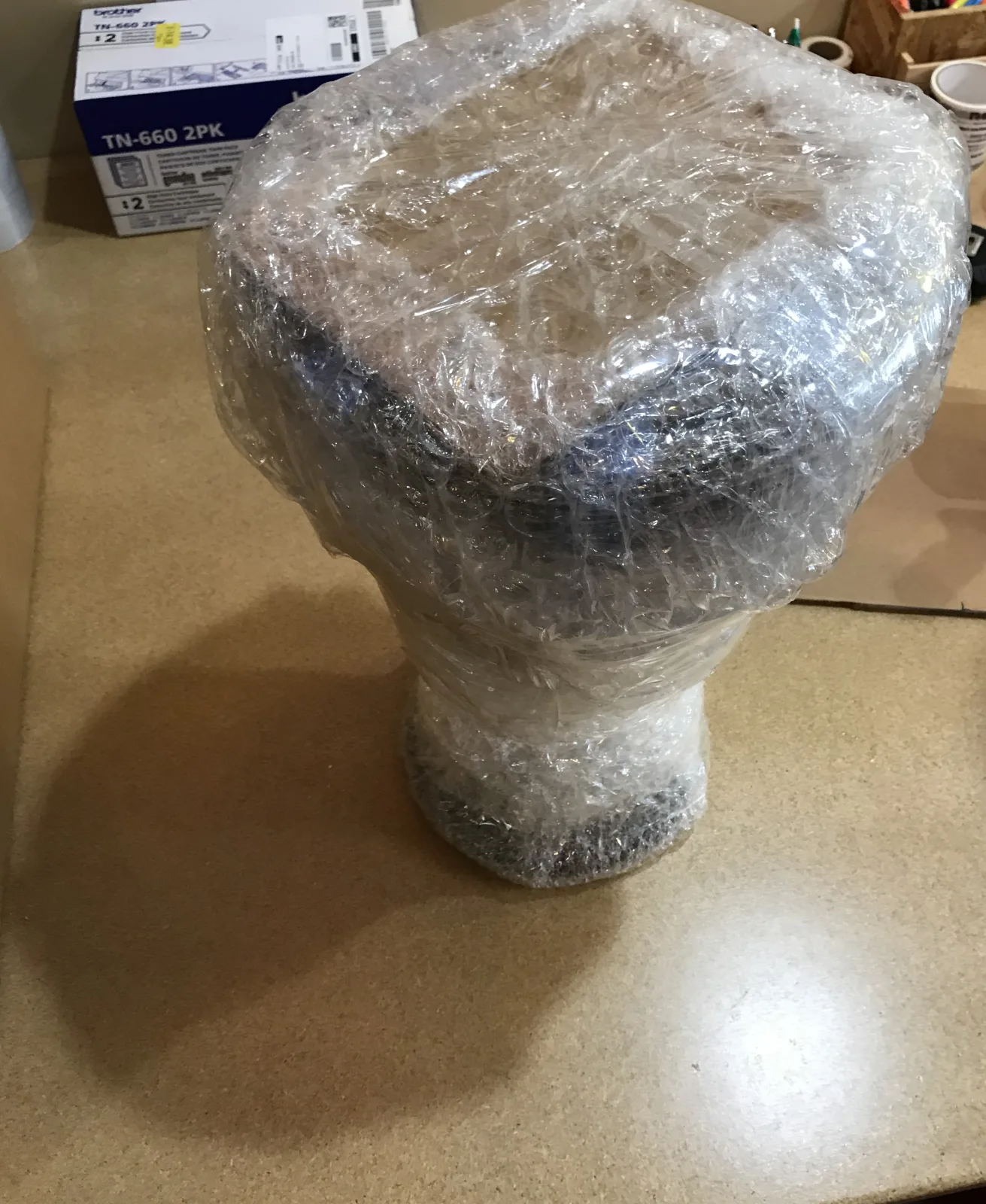 A recovered fragile item carefully wrapped for return shipping