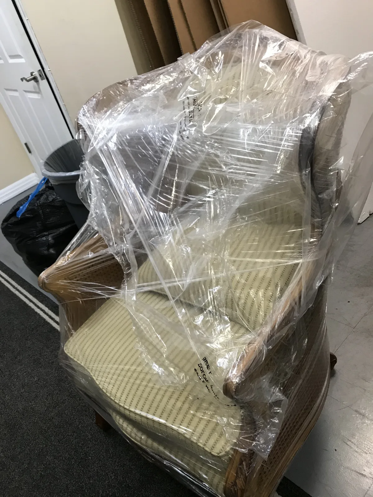 Large chair completely wrapped for transport and shipping